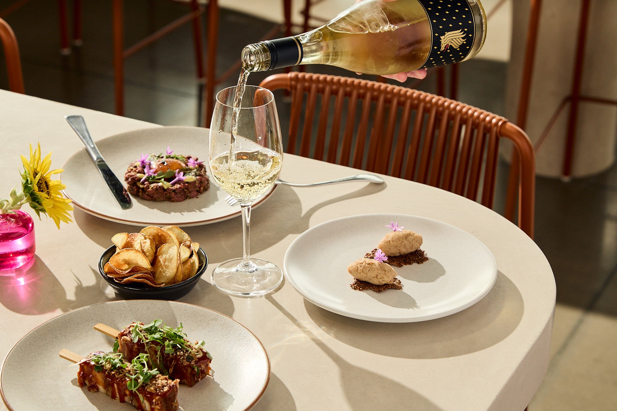 Food with Lienert Roussanne being poured into a glass